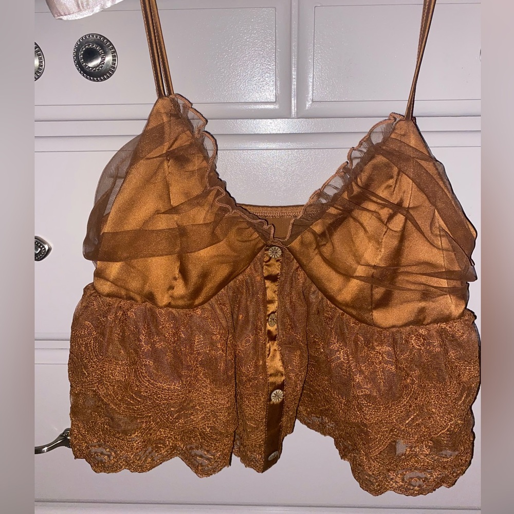 Super cute copper baby doll top! Size medium. Cropped and sheer lace under bust